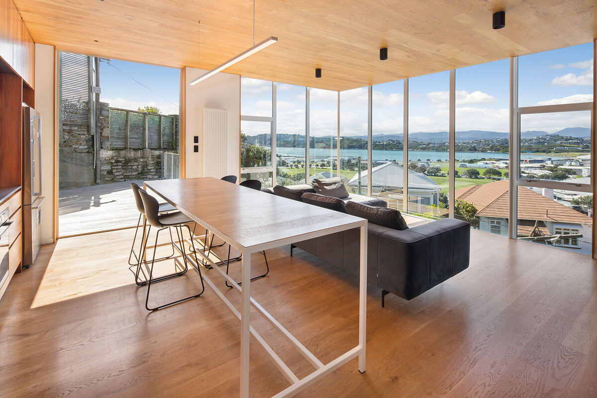 Glass balustrade deck with harbour view